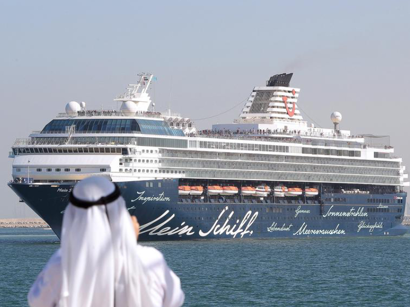 Image Represents An Arabic Businessman Starring A Large Cruise Ship From Shipyard