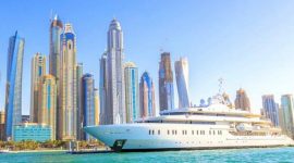 Large Cruise Ship Crossing THe City Dubai On A Sunny Day
