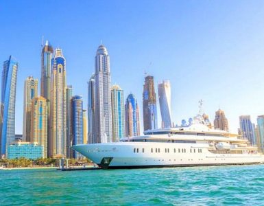 Large Cruise Ship Crossing THe City Dubai On A Sunny Day