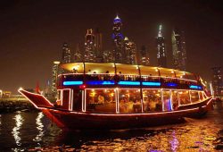 Image Showing A Beautiful Boat Leads To Cruise Terminal In A Night Time